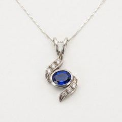 Created Sapphire Pendant made in 925 Sterling Silver with Baguette Created Blue Sapphire in Bezel setting, September Birthstone gift idea, symbolizes sincerity, truth, and faithfulness, ideal for everyday wear and perfect for birthday gifting and special occasions.