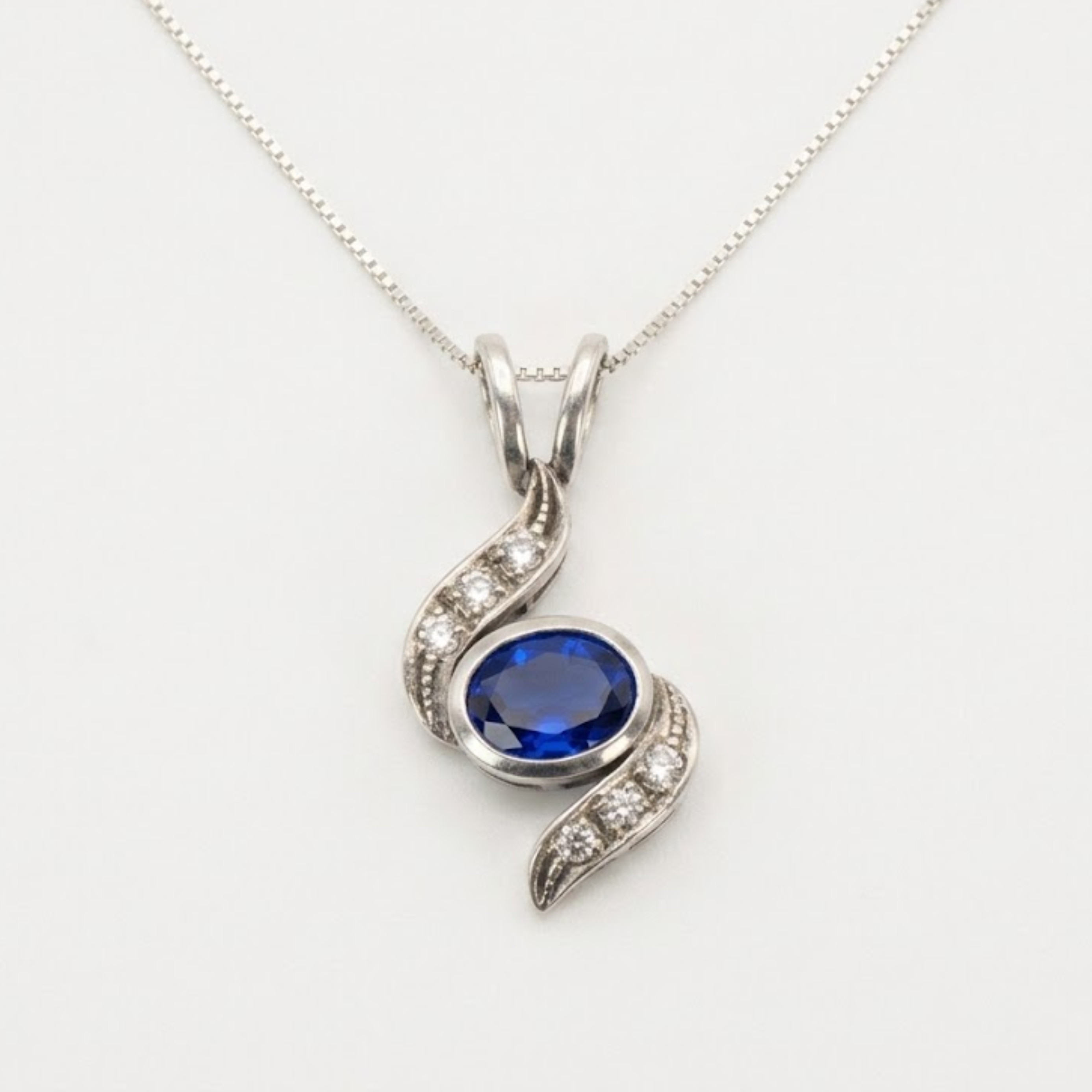 Created Sapphire Pendant made in 925 Sterling Silver with Baguette Created Blue Sapphire in Bezel setting, September Birthstone gift idea, symbolizes sincerity, truth, and faithfulness, ideal for everyday wear and perfect for birthday gifting and special occasions.