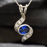 Created Sapphire Pendant made in 925 Sterling Silver with Baguette Created Blue Sapphire in Bezel setting, September Birthstone gift idea, symbolizes sincerity, truth, and faithfulness, ideal for everyday wear and perfect for birthday gifting and special occasions.