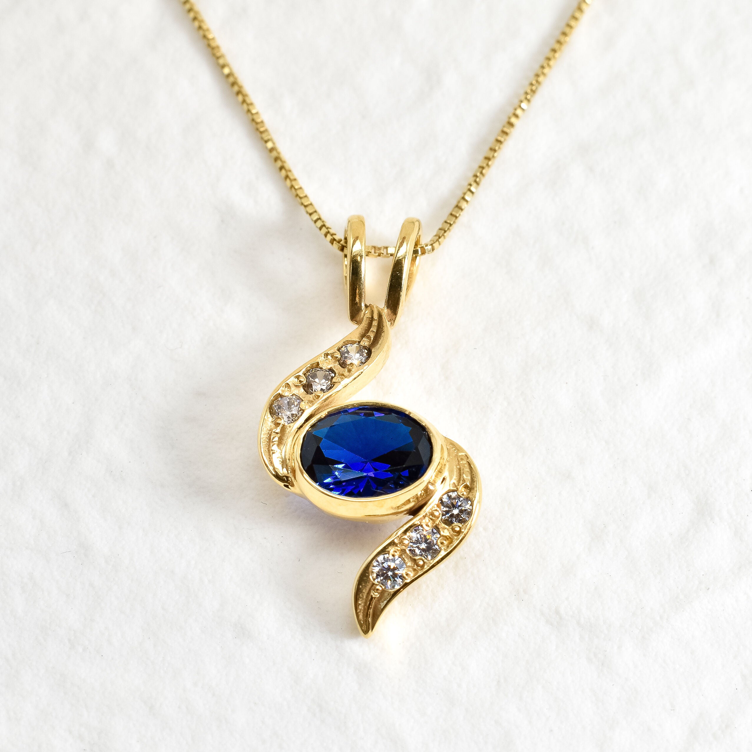 Created Sapphire Pendant made in 18k Gold Vermeil with Baguette Created Blue Sapphire in Bezel setting, September Birthstone gift idea, symbolizes sincerity, truth, and faithfulness, ideal for everyday wear and perfect for birthday gifting and special occasions.