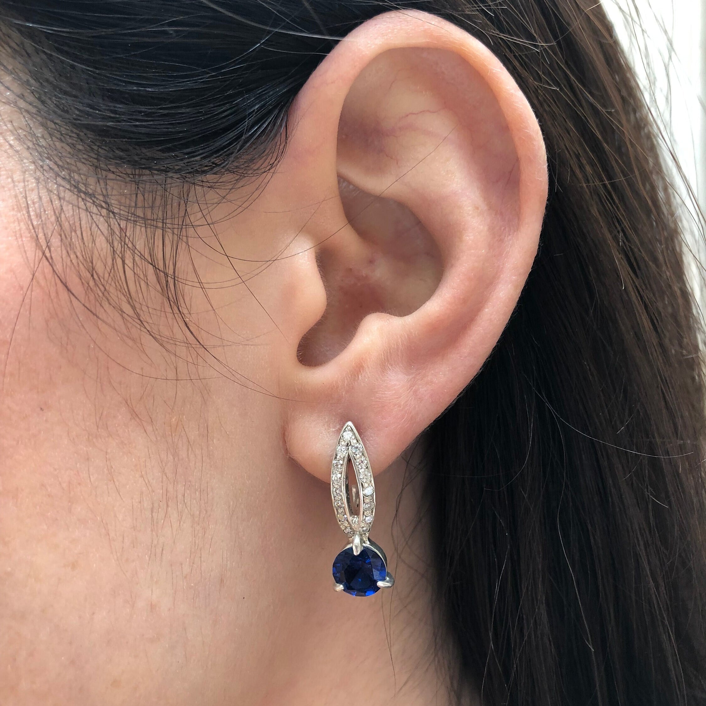 Sleek 925 Sterling Silver Sapphire Earrings featuring a round blue sapphire, perfect for September birthdays and everyday elegance.