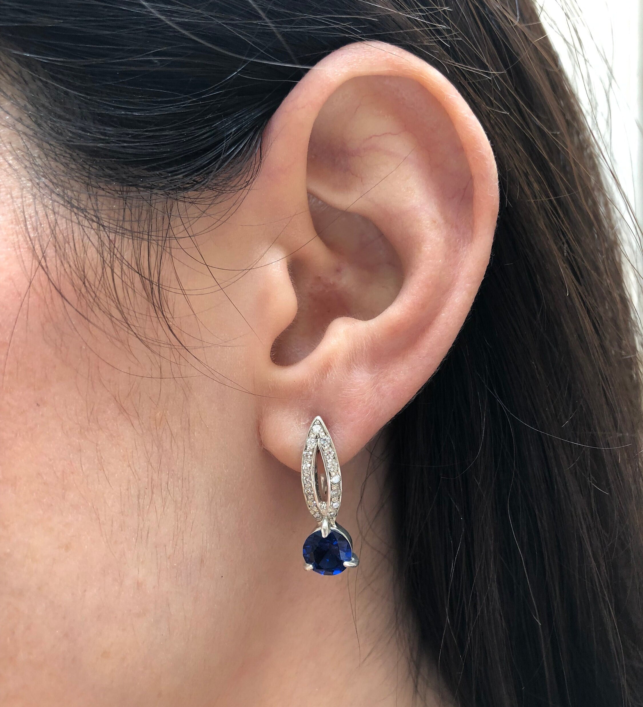 Sleek 925 Sterling Silver Sapphire Earrings featuring a round blue sapphire, perfect for September birthdays and everyday elegance.