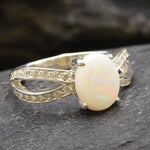 Delicate 925 Sterling Silver ring with Natural Australian Opal, a meaningful token of hope for October birthdays and daily wear.