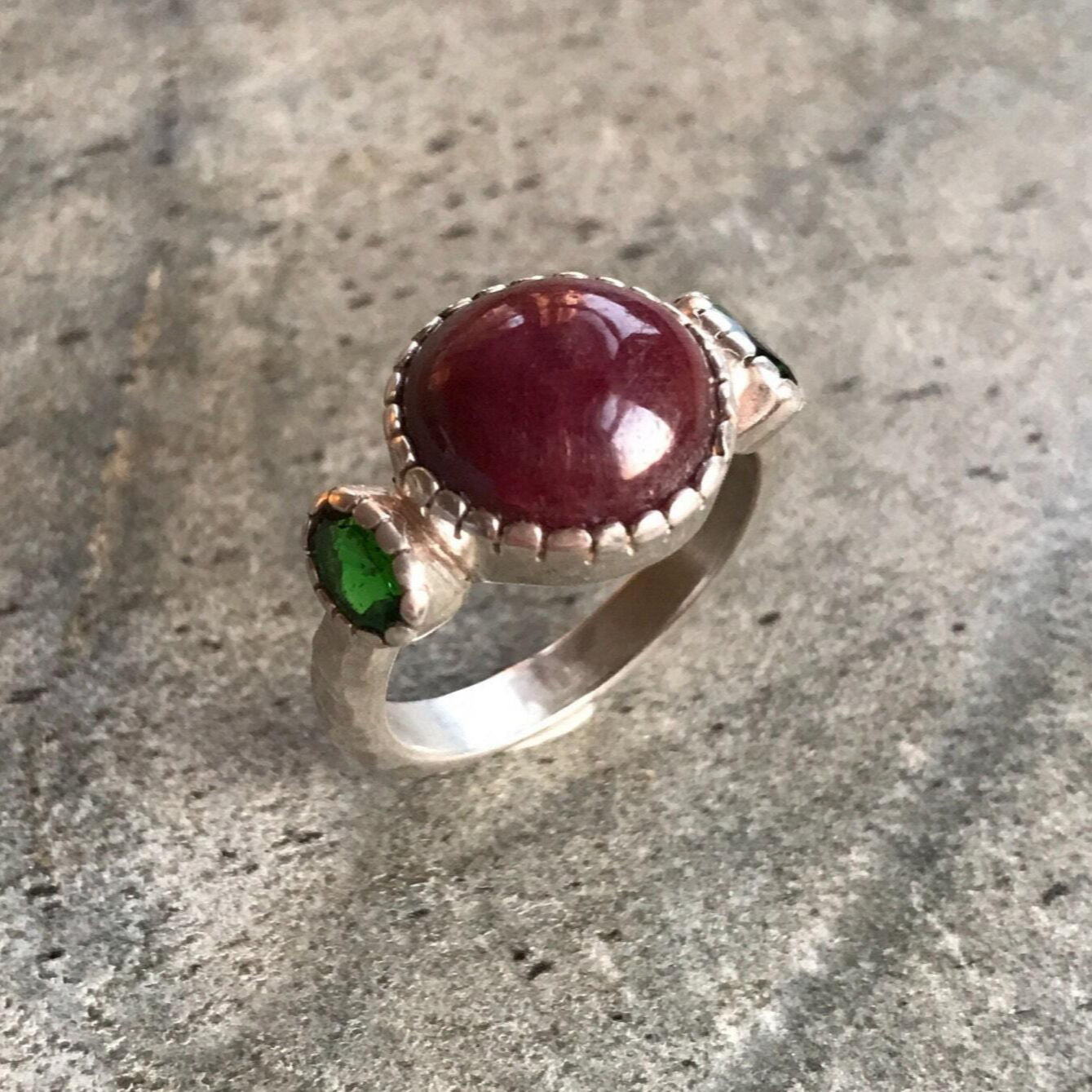 Elegant 925 Sterling Silver Ring featuring a round natural red ruby in a stunning three-stone design, perfect for celebrations.