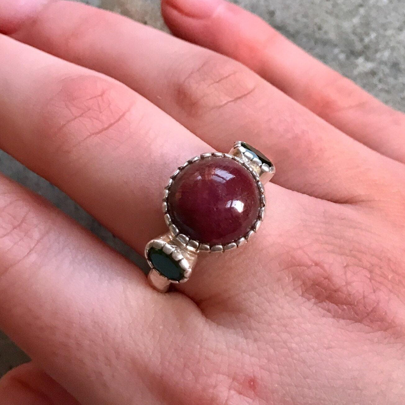 Natural Ruby Ring made in 925 Sterling Silver with Round Natural Red Ruby in Three-Stone setting, July Birthstone gift idea, symbolizes nobility, purity, and passion, ideal for everyday wear and perfect for birthday gifting and special occasions.