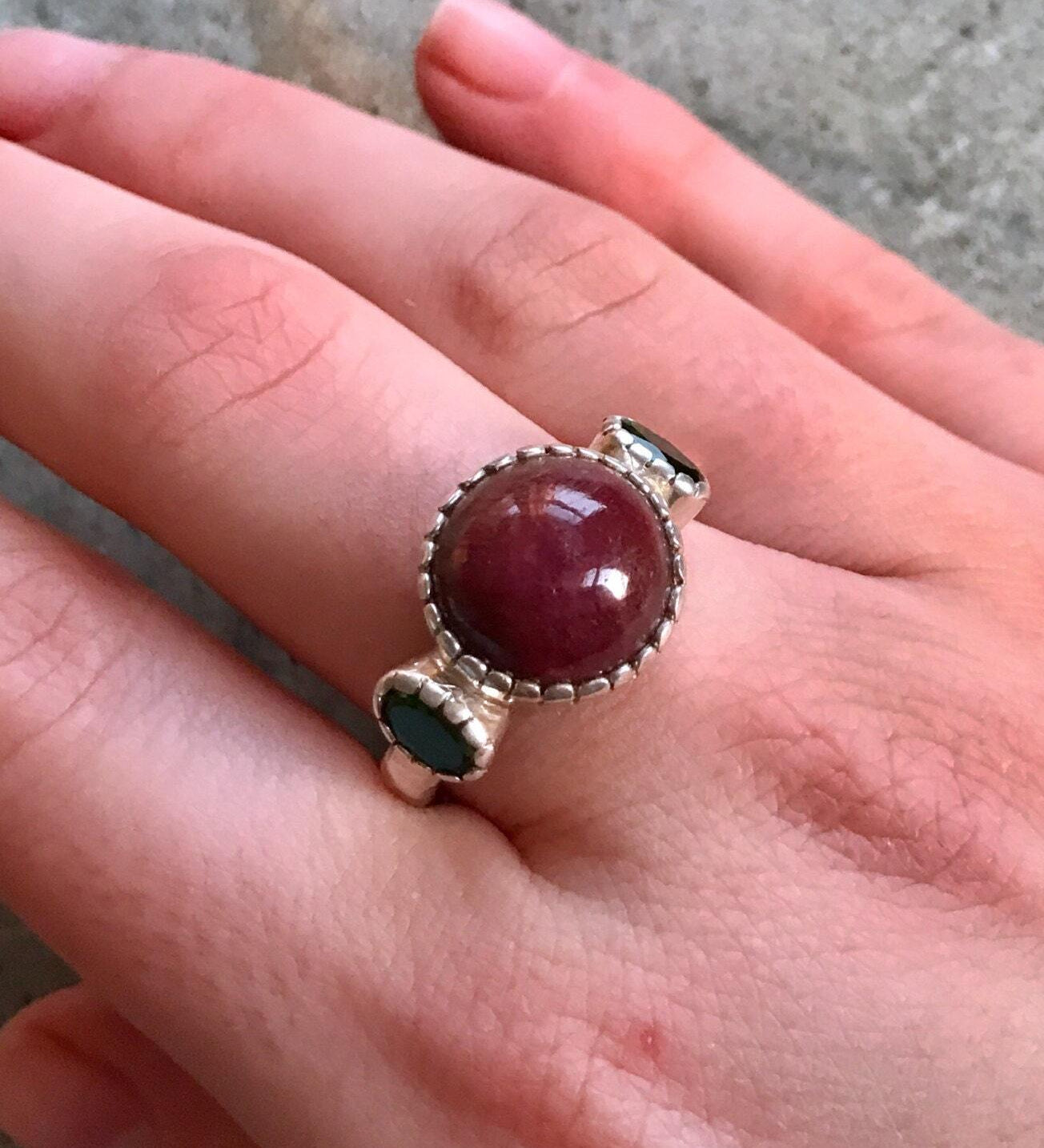 Natural Ruby Ring made in 925 Sterling Silver with Round Natural Red Ruby in Three-Stone setting, July Birthstone gift idea, symbolizes nobility, purity, and passion, ideal for everyday wear and perfect for birthday gifting and special occasions.