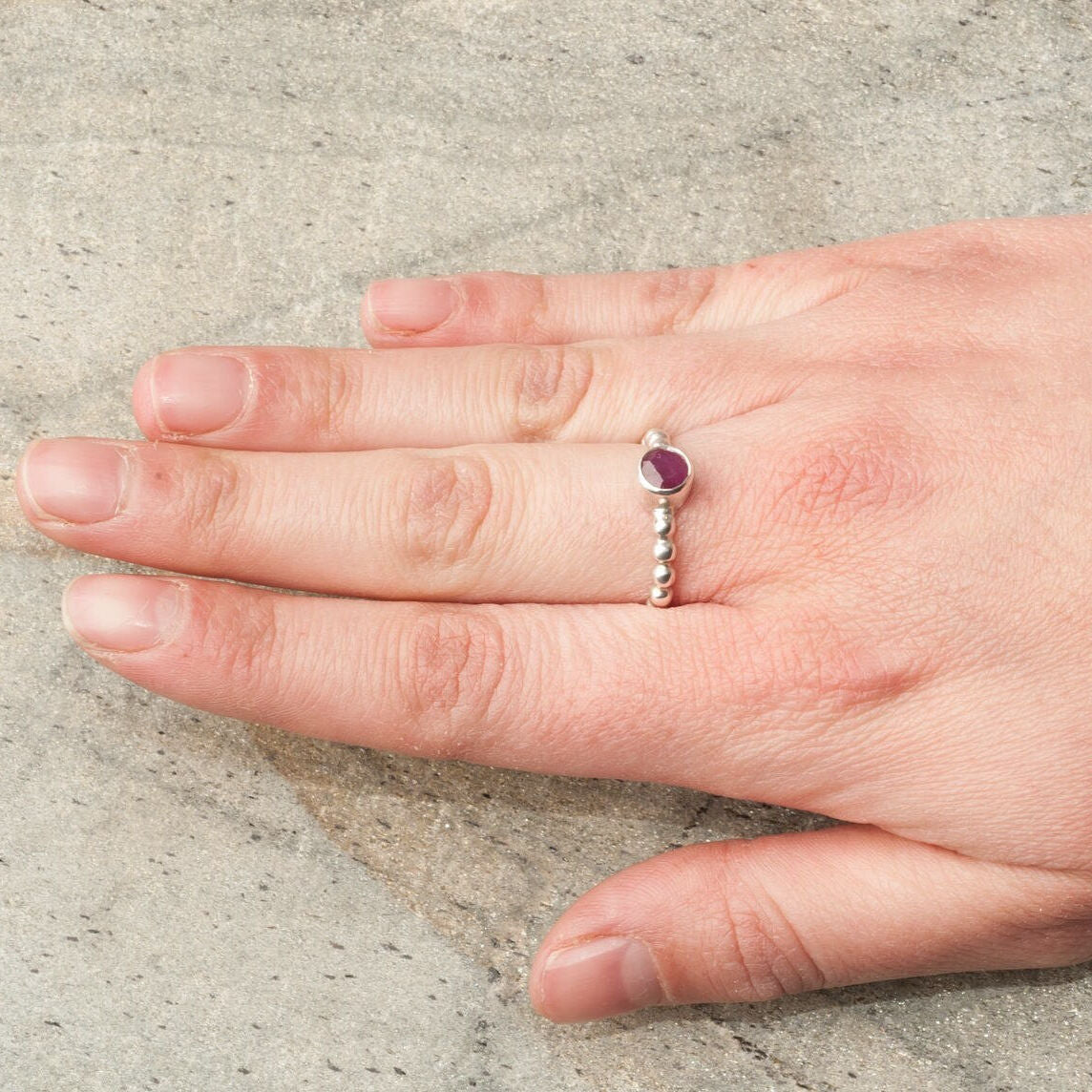Natural Ruby Ring in 925 Sterling Silver, featuring a round red ruby in a bezel setting, perfect for birthdays and special occasions.
