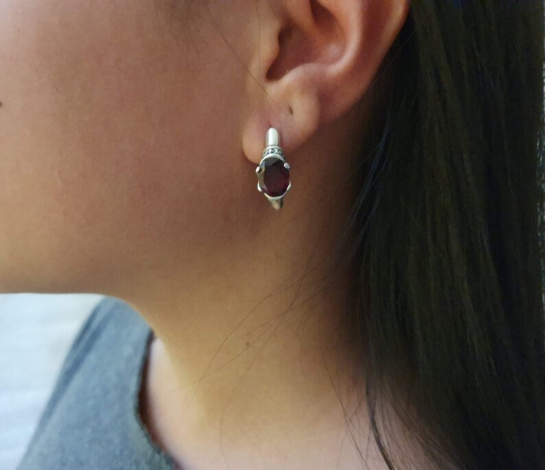 Emerald Stud Earrings in 925 Sterling Silver, featuring Oval Green Emeralds. Perfect May birthday gift for any occasion.