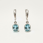 Created Aquamarine Earrings made in 925 Sterling Silver with Oval Created Blue Aquamarine in Bezel setting, March Birthstone gift idea, symbolizes courage & good luck, ideal for everyday wear and perfect for birthday gifting and special occasions.
