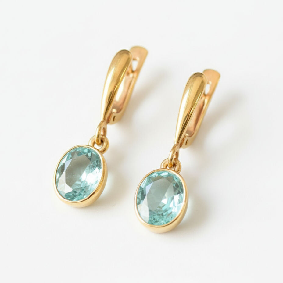 Created Aquamarine Earrings made in 18k Gold Vermeil with Oval Created Blue Aquamarine in Bezel setting, March Birthstone gift idea, symbolizes courage & good luck, ideal for everyday wear and perfect for birthday gifting and special occasions.
