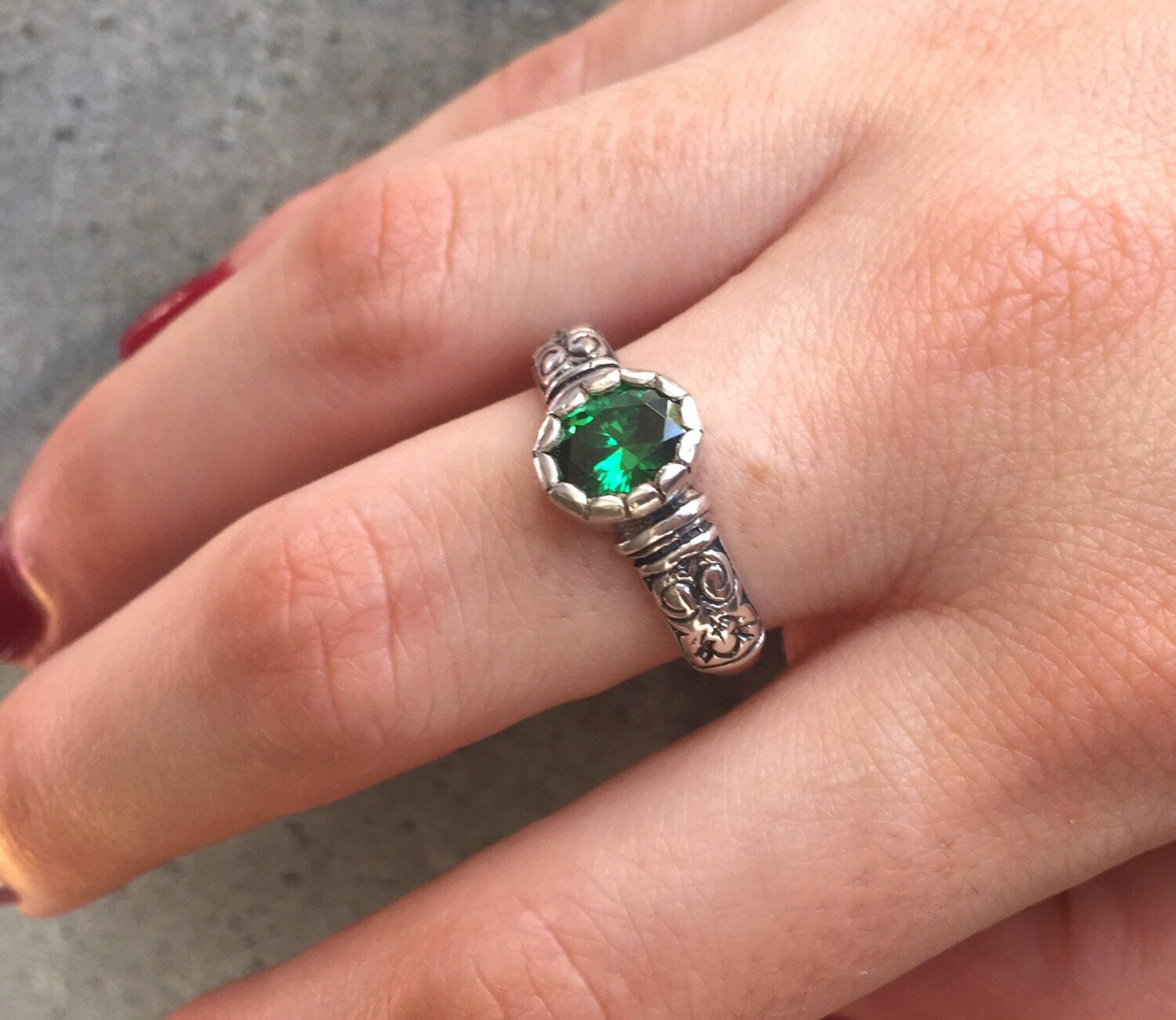 Sterling Silver Emerald Ring with Oval Created Green Emerald, perfect for May birthdays and special occasions.