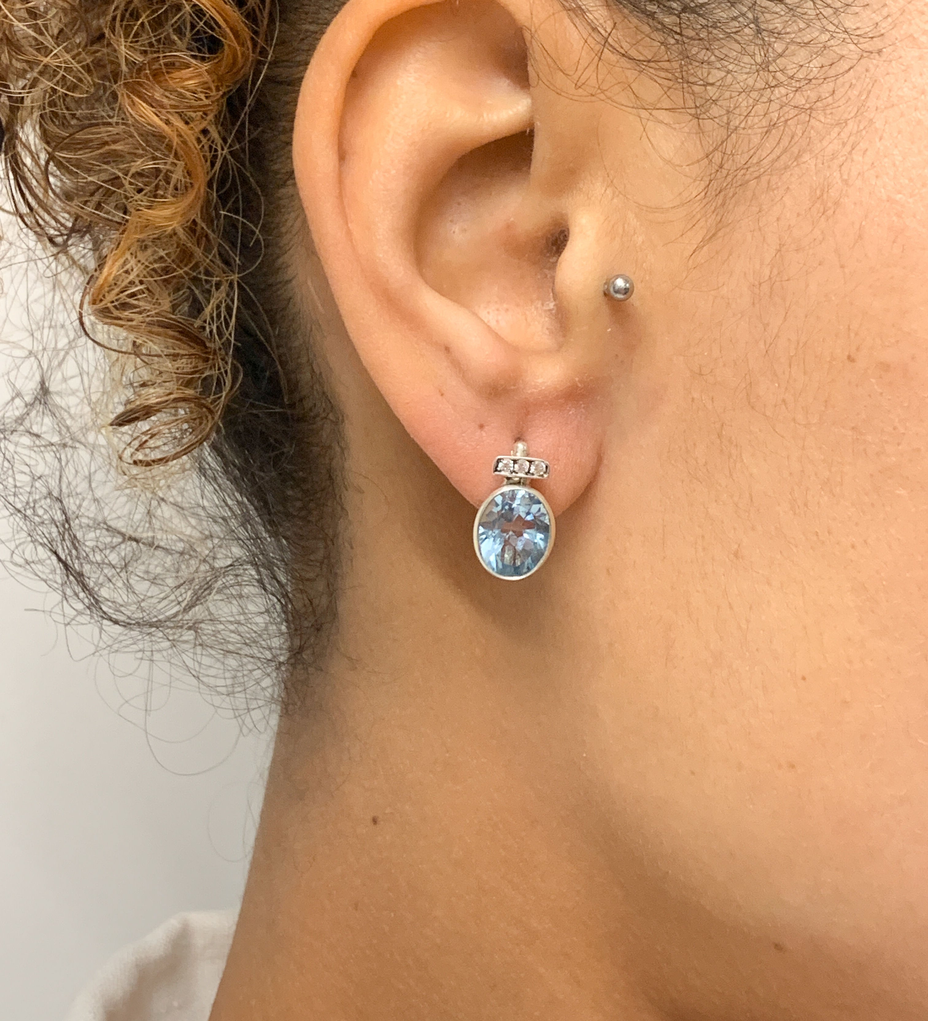 Stylish 925 Sterling Silver Emerald Earrings with Bezel-setting, perfect for May birthdays and everyday elegance.