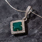 Beautifully crafted 925 Sterling Silver pendant showcasing a Square Created Green Emerald, an ideal May birthstone keepsake.