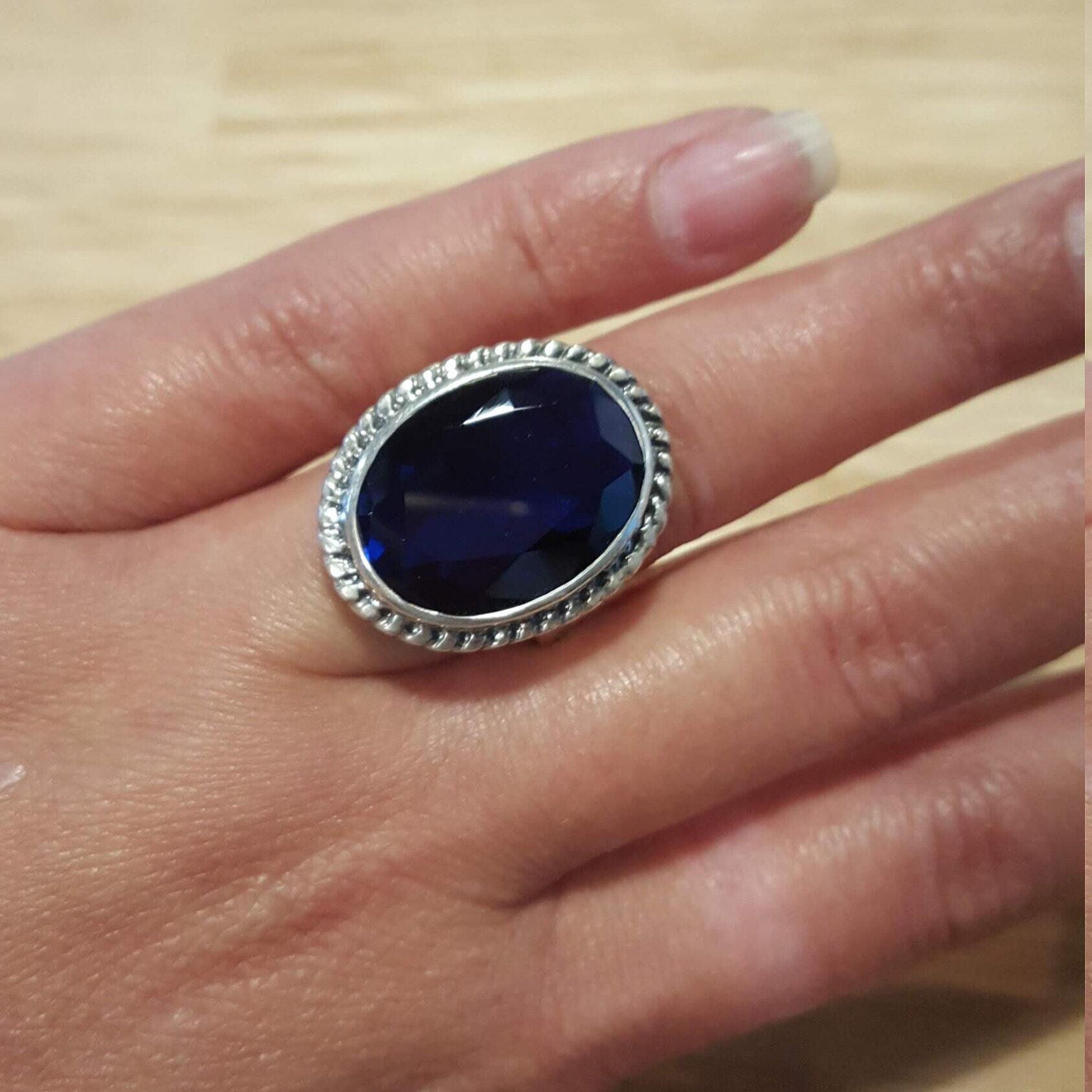 Created Sapphire Ring in 925 Sterling Silver with Oval Blue Sapphire, perfect for gifts or everyday elegance. September birthstone.