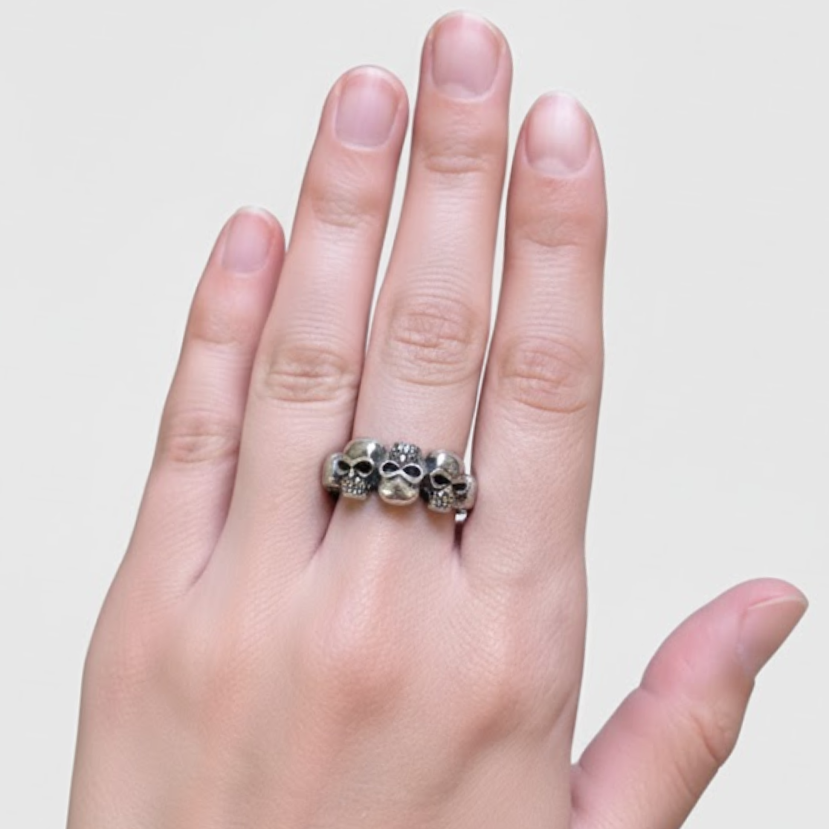 Silver Skulls Ring - Detailed Gothic Skull Design in 925 Sterling Silver. Stylish accessory for everyday use and gifting.