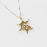 Elegant gold sun pendant necklace in 18k Gold Vermeil, perfect for special occasions and everyday elegance.