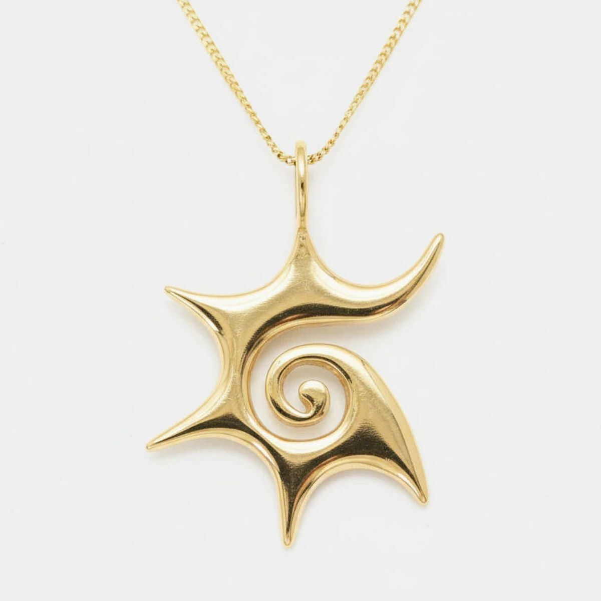 Gold Sun Pendant - Swirl Gold Necklace, Star Necklace made in 18k Gold Vermeil. Ideal for everyday wear and perfect for birthday gifting and special occasions.