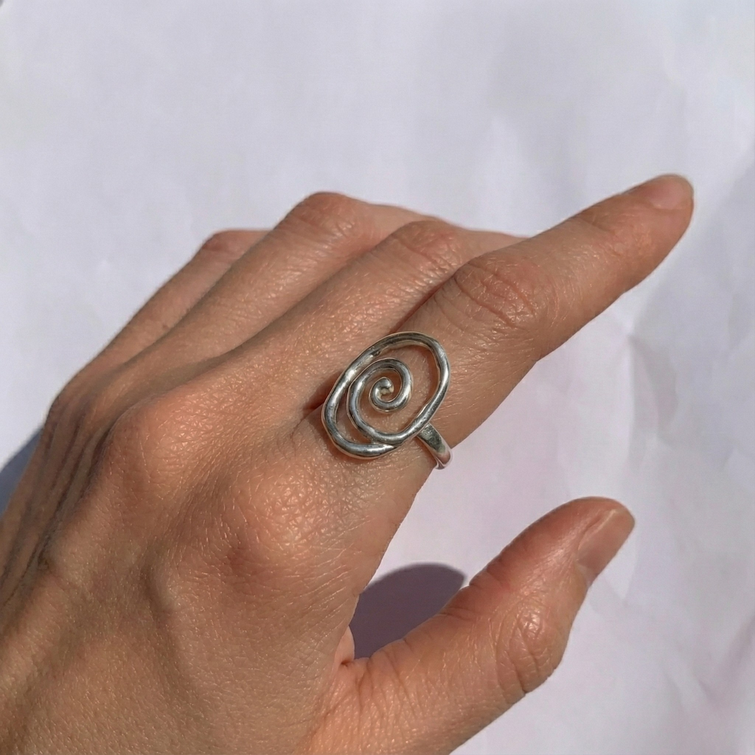 Bold Silver Infinity Ring featuring a captivating swirl pattern, made from durable 925 Sterling Silver for timeless elegance.