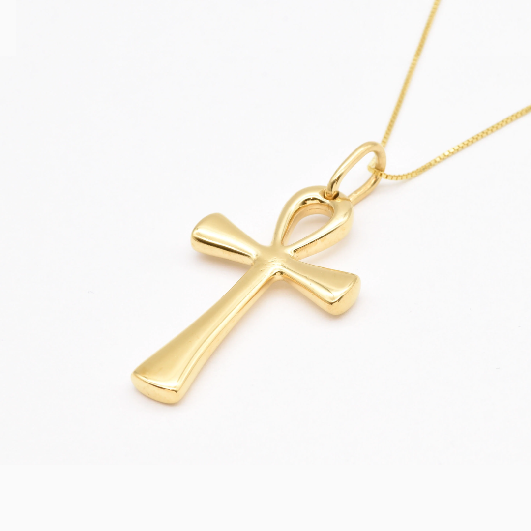 Chic Gold Cross Pendant featuring the Egyptian Ankh, an exquisite piece for everyday elegance and meaningful gifting.