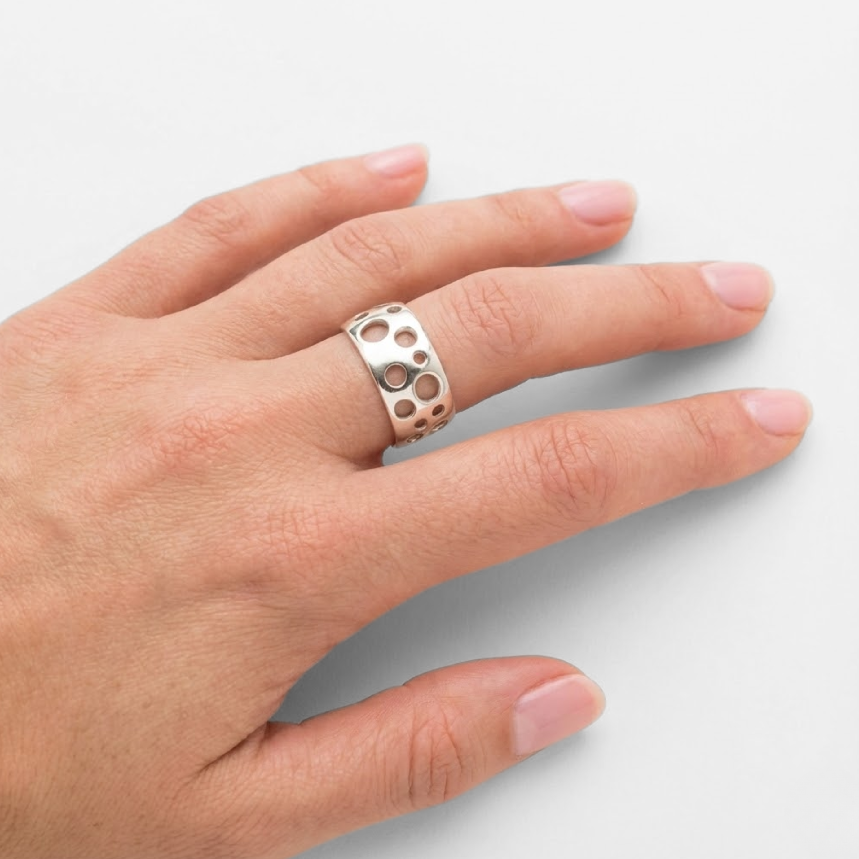 Silver Holes Ring - Bold Moon Crater Style in 925 Sterling Silver, Ideal for Casual Wear and Memorable Gifts.