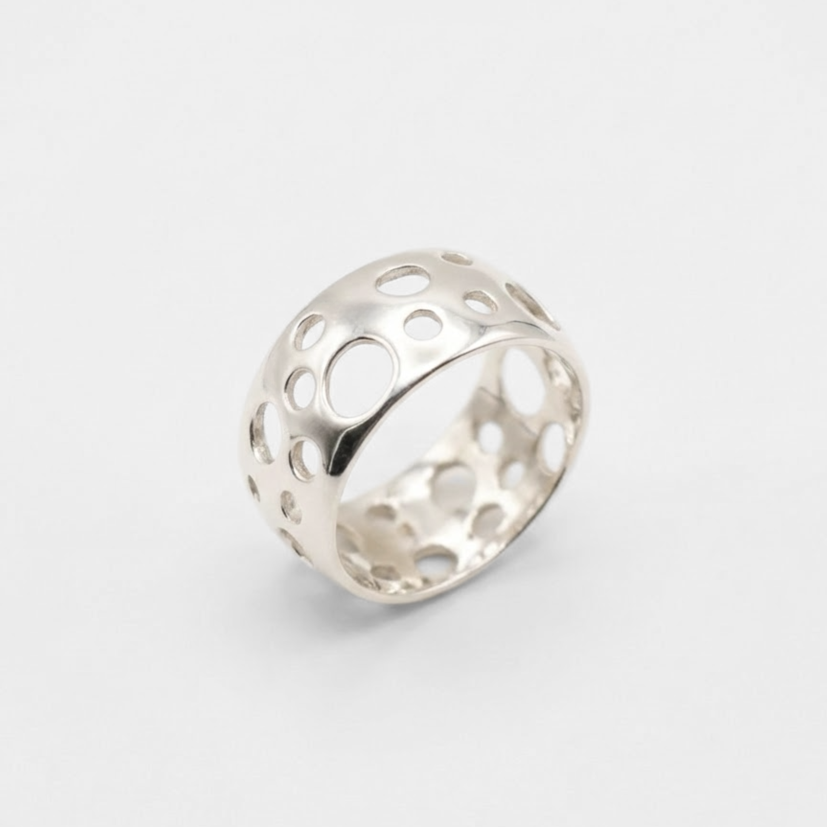 Silver Holes Ring - Moon Crater Ring - Wide Silver Band made in 925 Sterling Silver. Ideal for everyday wear and perfect for birthday gifting and special occasions.
