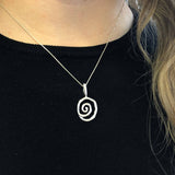 Chic silver spiral necklace, crafted in 925 sterling silver, a versatile statement piece for daily wear and gifting.
