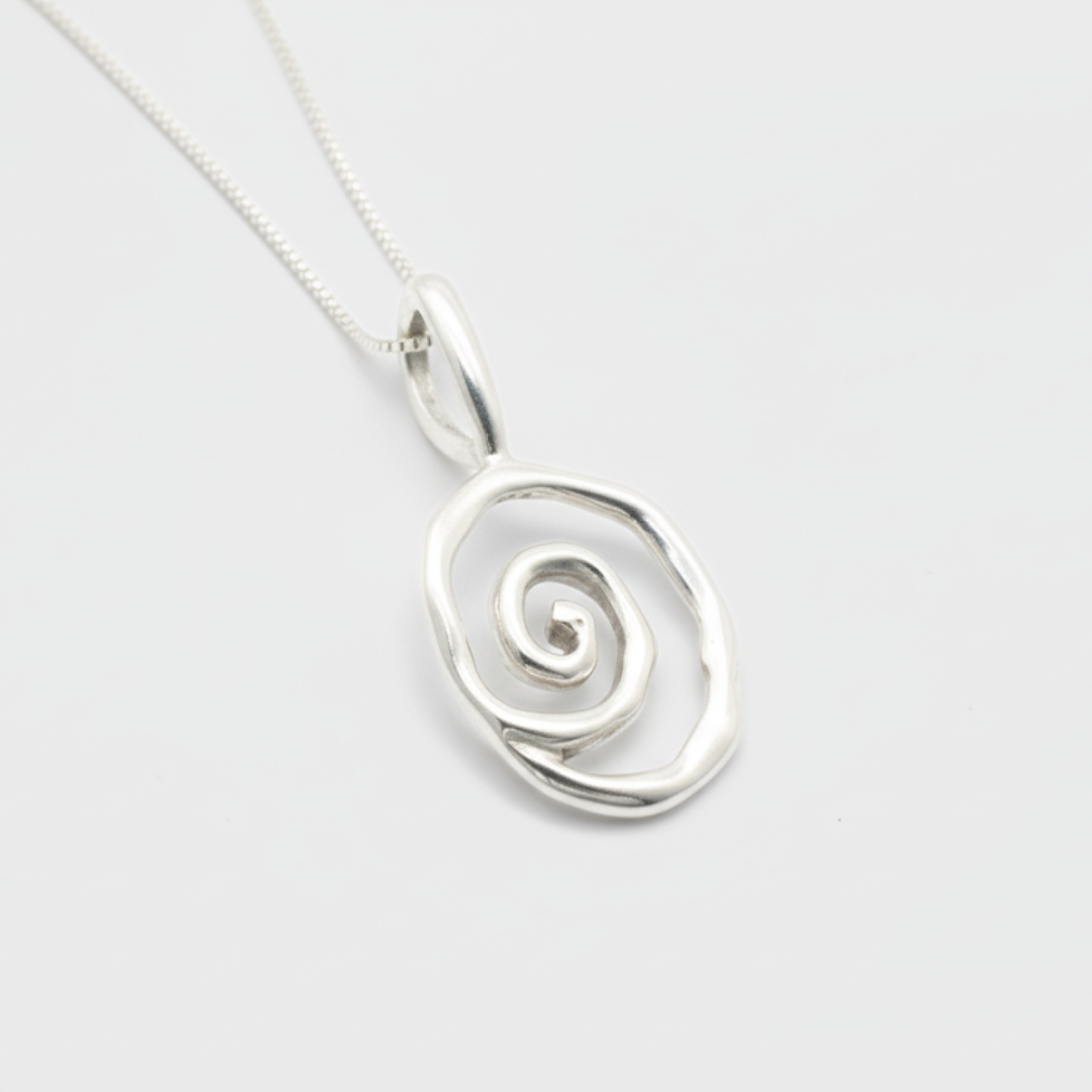 Stylish silver spiral pendant necklace, crafted in 925 sterling silver, ideal for enhancing your accessory collection.