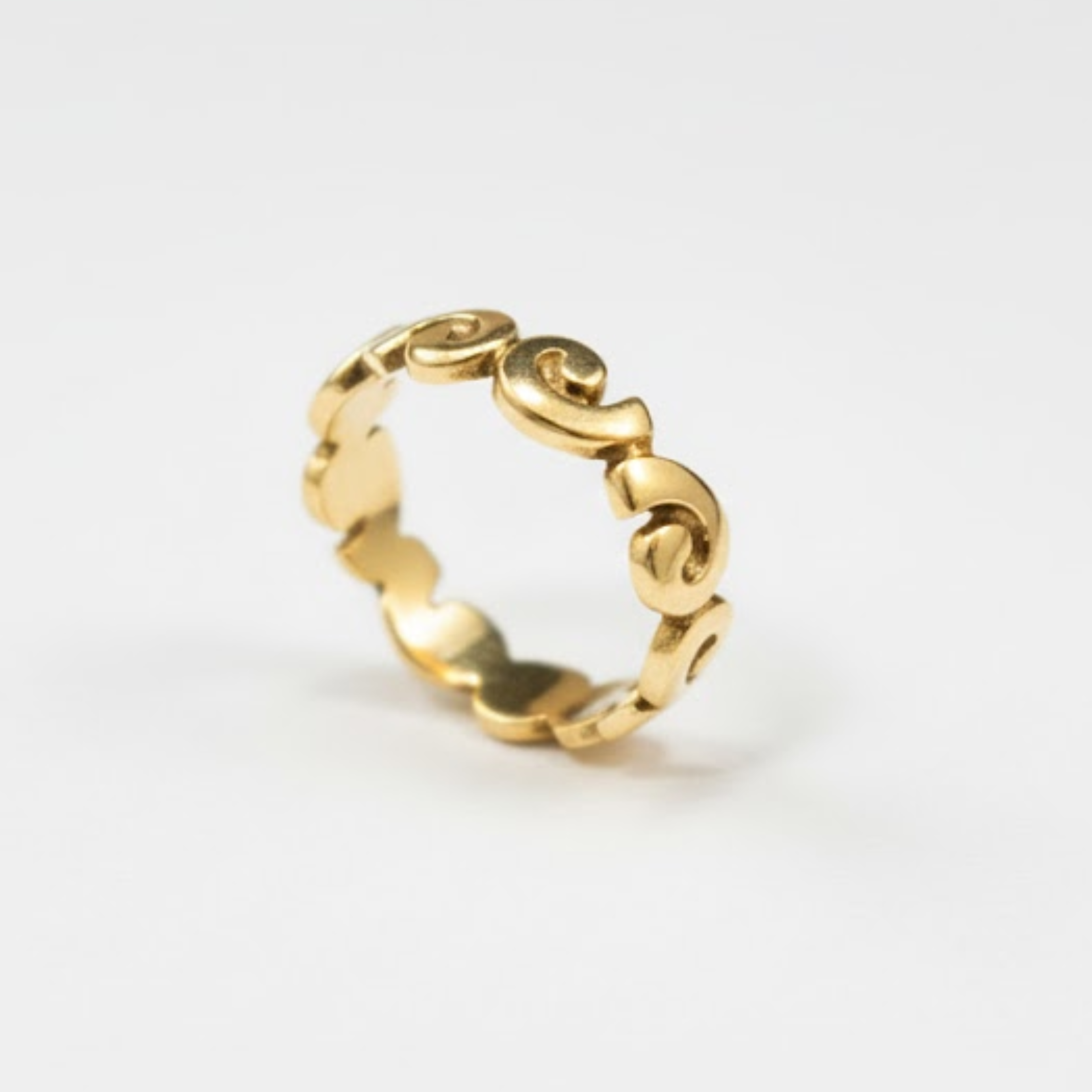 Graceful Gold Wavy Spiral Ring in 18k Gold Vermeil, a stylish addition to any outfit. Perfect for casual wear or as a thoughtful gift.