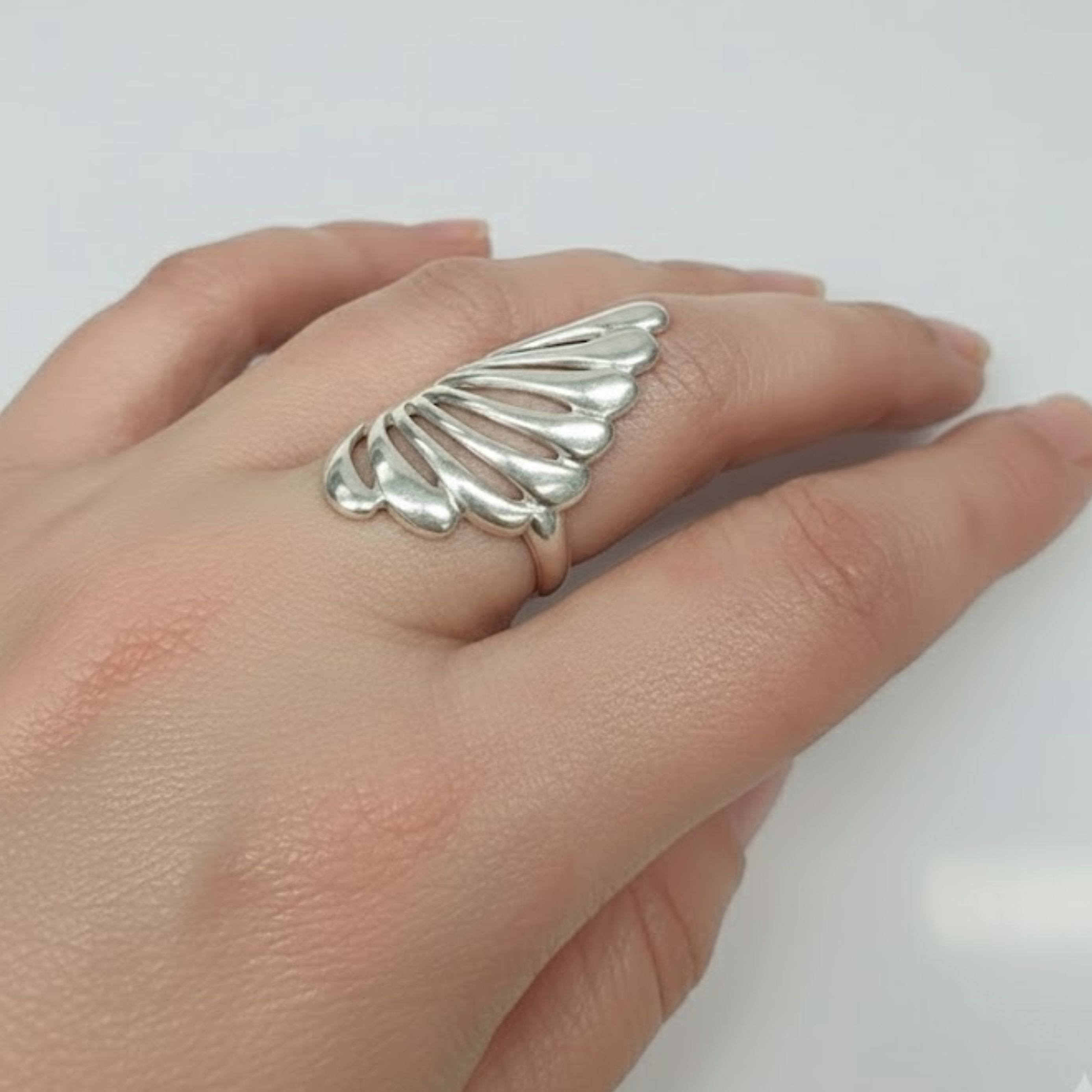 Angel Wing Ring in sterling silver, featuring a delicate design for everyday elegance and special occasion gifting.