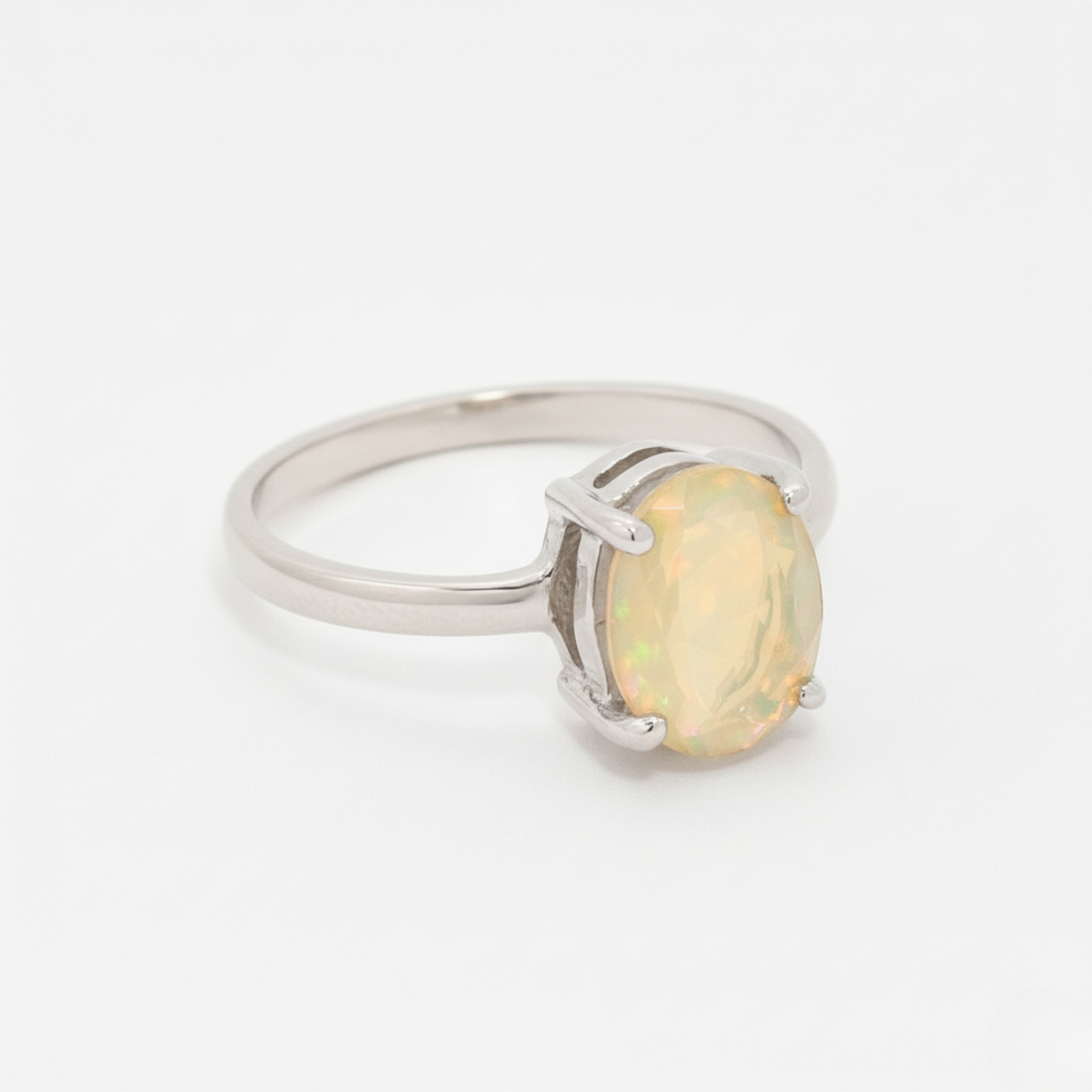 Charming 925 Sterling Silver ring with oval fire opal, a meaningful gift for October birthdays and special occasions.