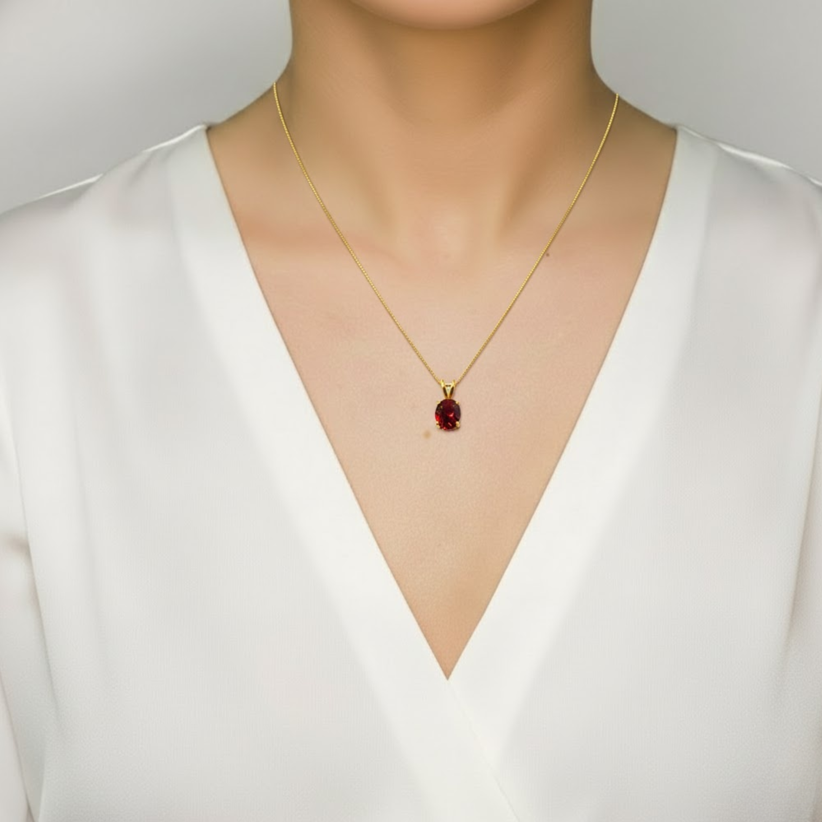 18k Gold Vermeil pendant featuring a prong-set oval Created Red Ruby, a stunning July birthstone gift for any occasion.