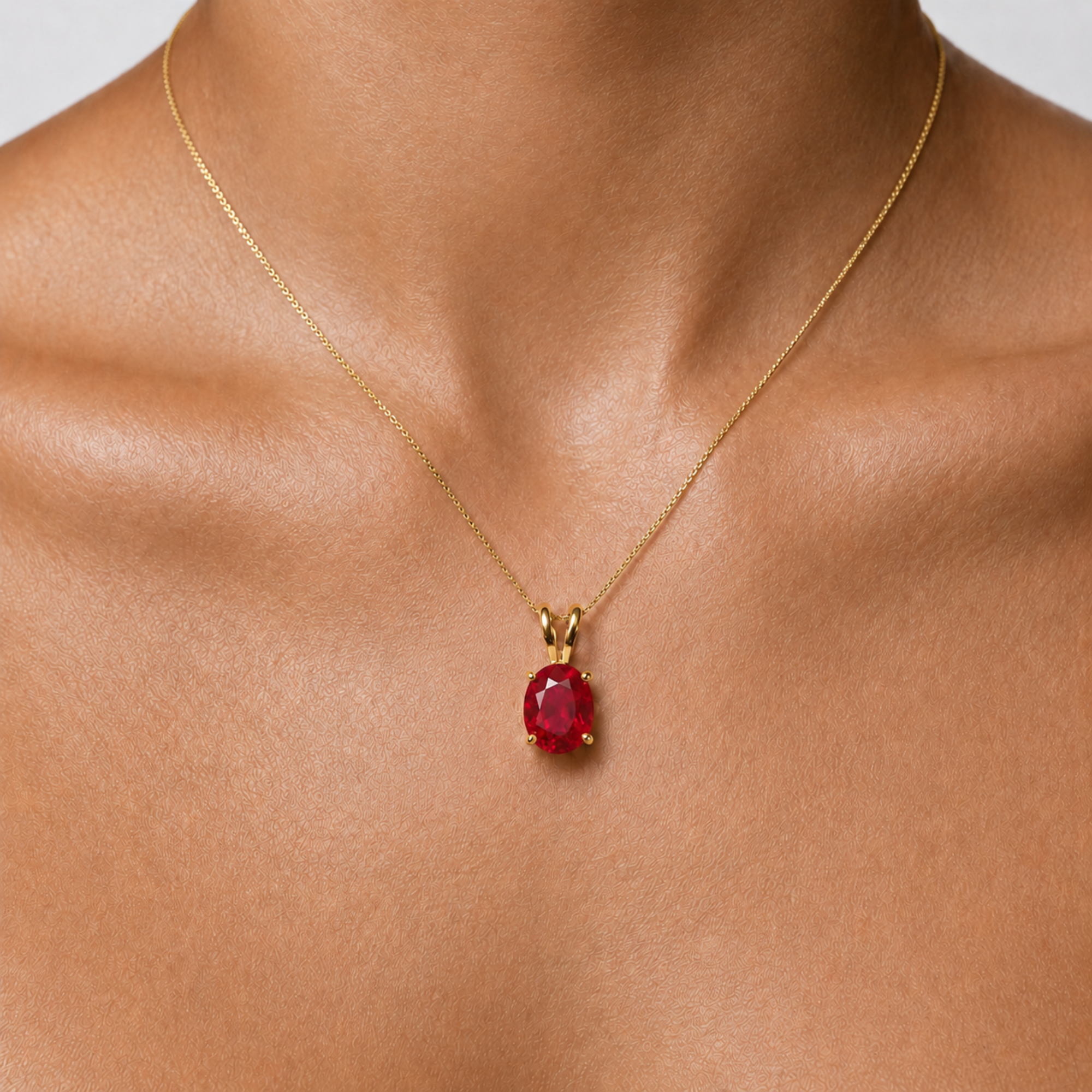 18k Gold Vermeil pendant featuring a prong-set oval Created Red Ruby, a stunning July birthstone gift for any occasion.