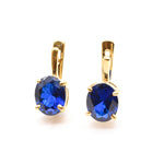 Created Sapphire Earrings made in 18k Gold Vermeil with Oval Created Blue Sapphire in Prong setting, September Birthstone gift idea, symbolizes sincerity, truth, and faithfulness, ideal for everyday wear and perfect for birthday gifting and special occasions.