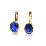 Created Sapphire Earrings made in 18k Gold Vermeil with Oval Created Blue Sapphire in Prong setting, September Birthstone gift idea, symbolizes sincerity, truth, and faithfulness, ideal for everyday wear and perfect for birthday gifting and special occasions.