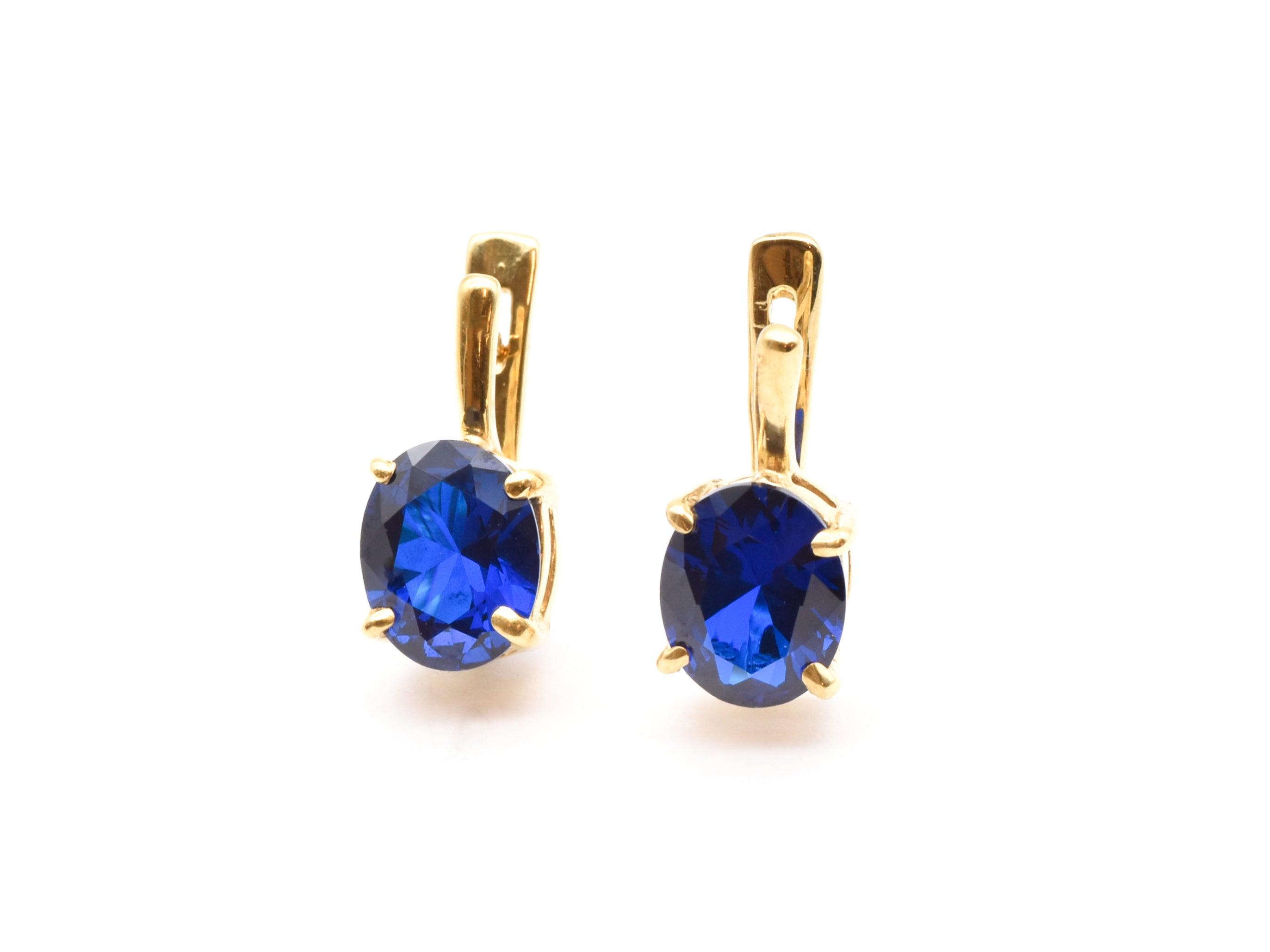 Created Sapphire Earrings made in 18k Gold Vermeil with Oval Created Blue Sapphire in Prong setting, September Birthstone gift idea, symbolizes sincerity, truth, and faithfulness, ideal for everyday wear and perfect for birthday gifting and special occasions.