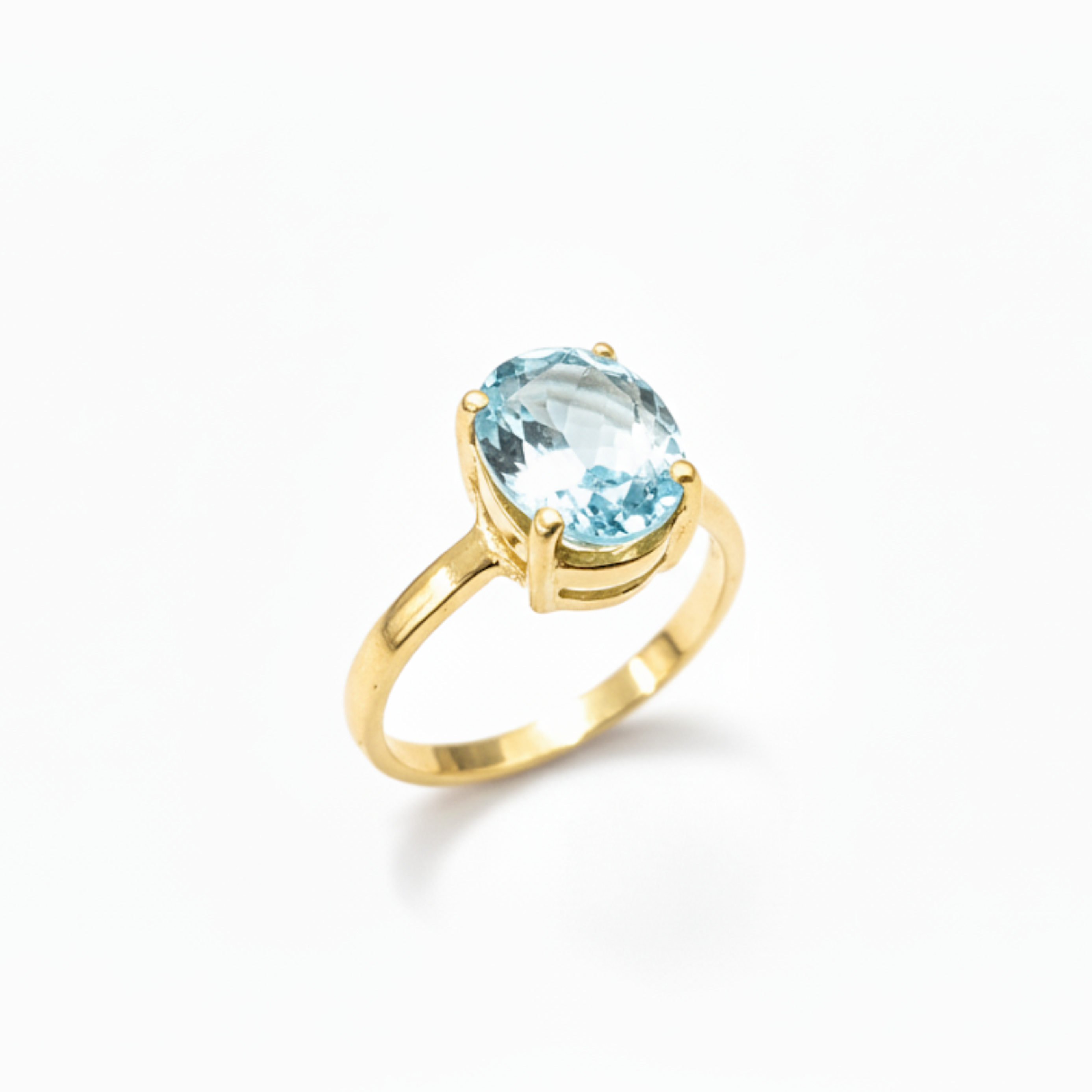 Gold Blue Topaz Ring - Natural Blue Topaz Ring, Blue Oval Gold Ring made in 18k Gold Vermeil. Ideal for everyday wear and perfect for birthday gifting and special occasions.