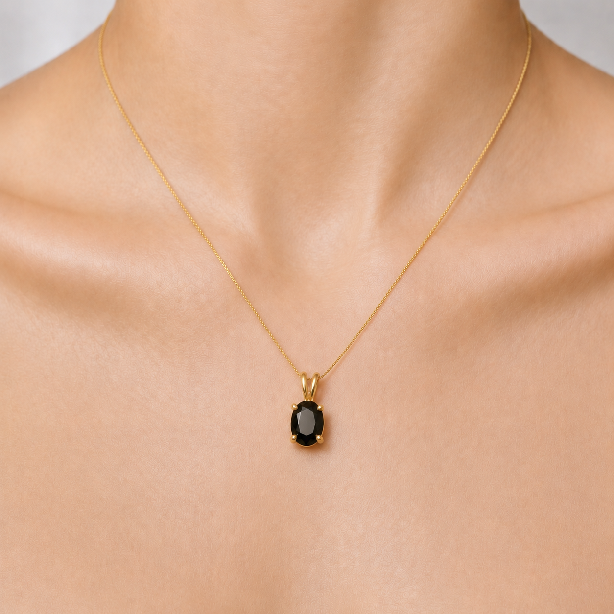 Gold Onyx Pendant close-up - Elegant black oval pendant in 18k Gold Vermeil for daily wear and special gift occasions.