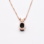 Onyx Rose Gold Necklace - Elegant black onyx pendant set in rose gold, ideal for casual elegance and thoughtful gifts.