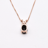 Onyx Rose Gold Necklace - Elegant black onyx pendant set in rose gold, ideal for casual elegance and thoughtful gifts.