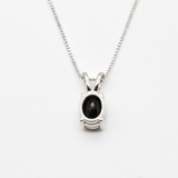 Dazzling Silver Onyx Necklace featuring natural black onyx and diamond details, perfect for elevating any outfit beautifully.