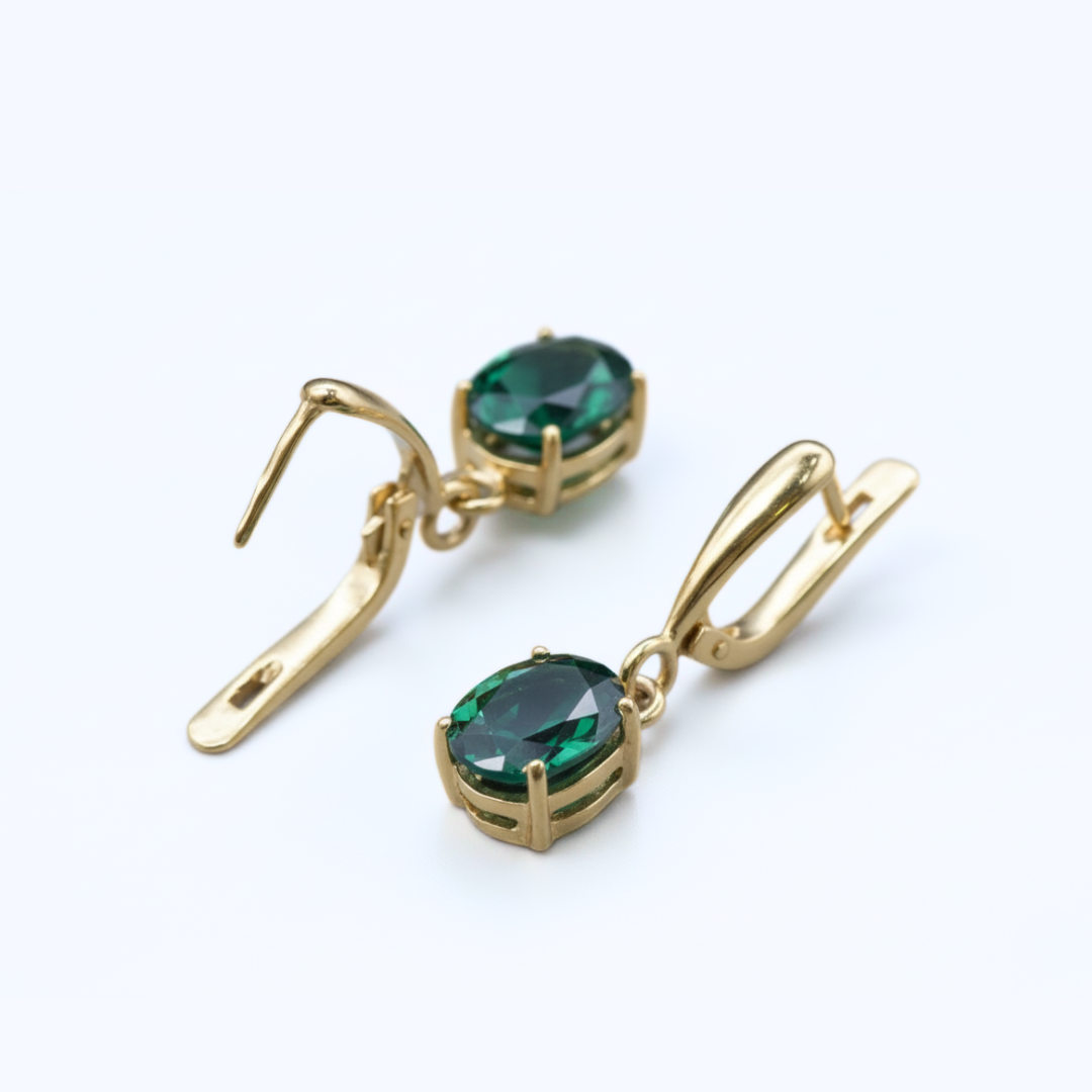 Chic 18k Gold Vermeil Emerald Earrings with vibrant created green gemstones, perfect for adding glamour to any look.