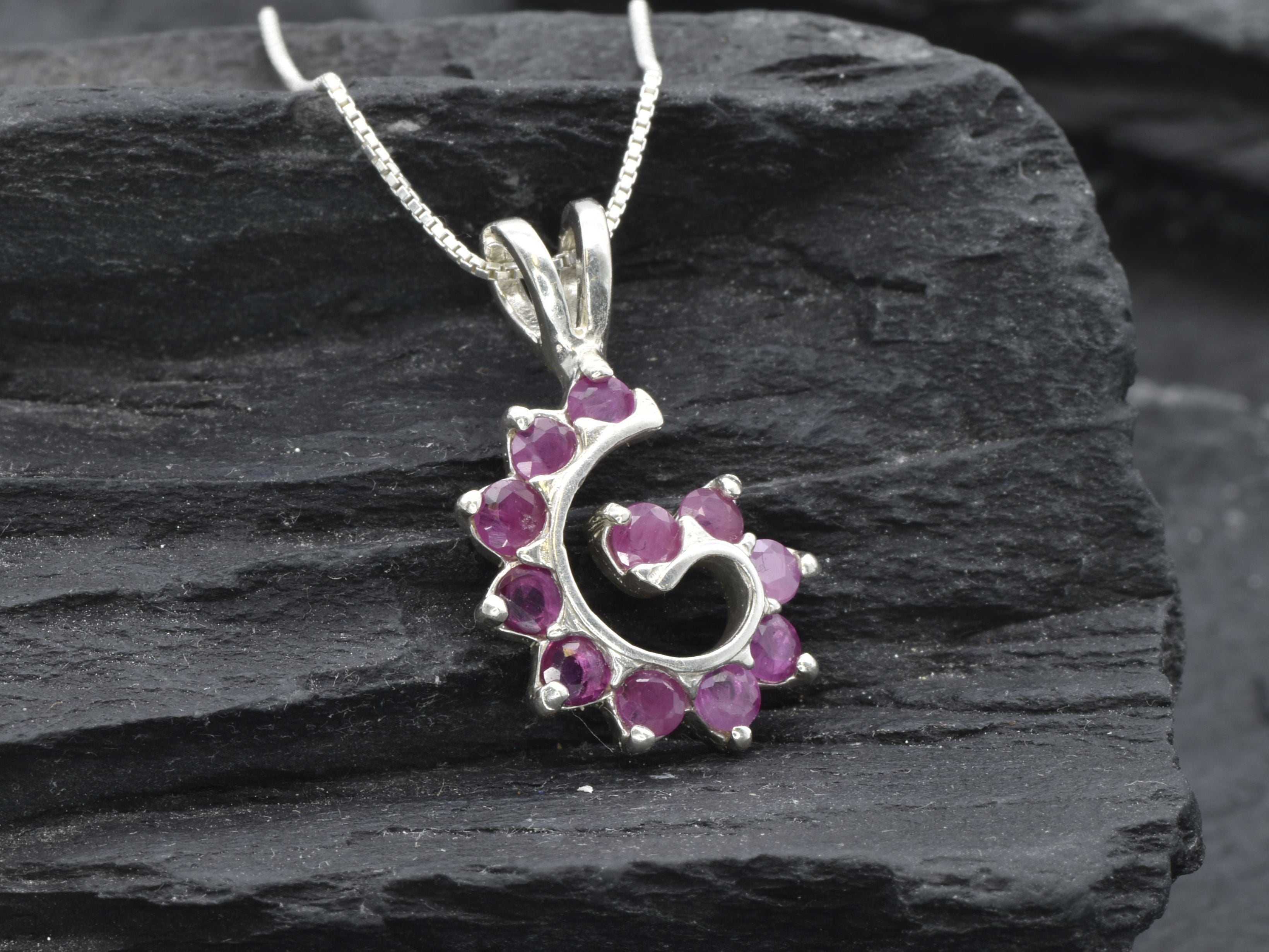 Elegant 925 Sterling Silver Natural Ruby Pendant with cluster setting, perfect gift for July birthdays and special occasions.