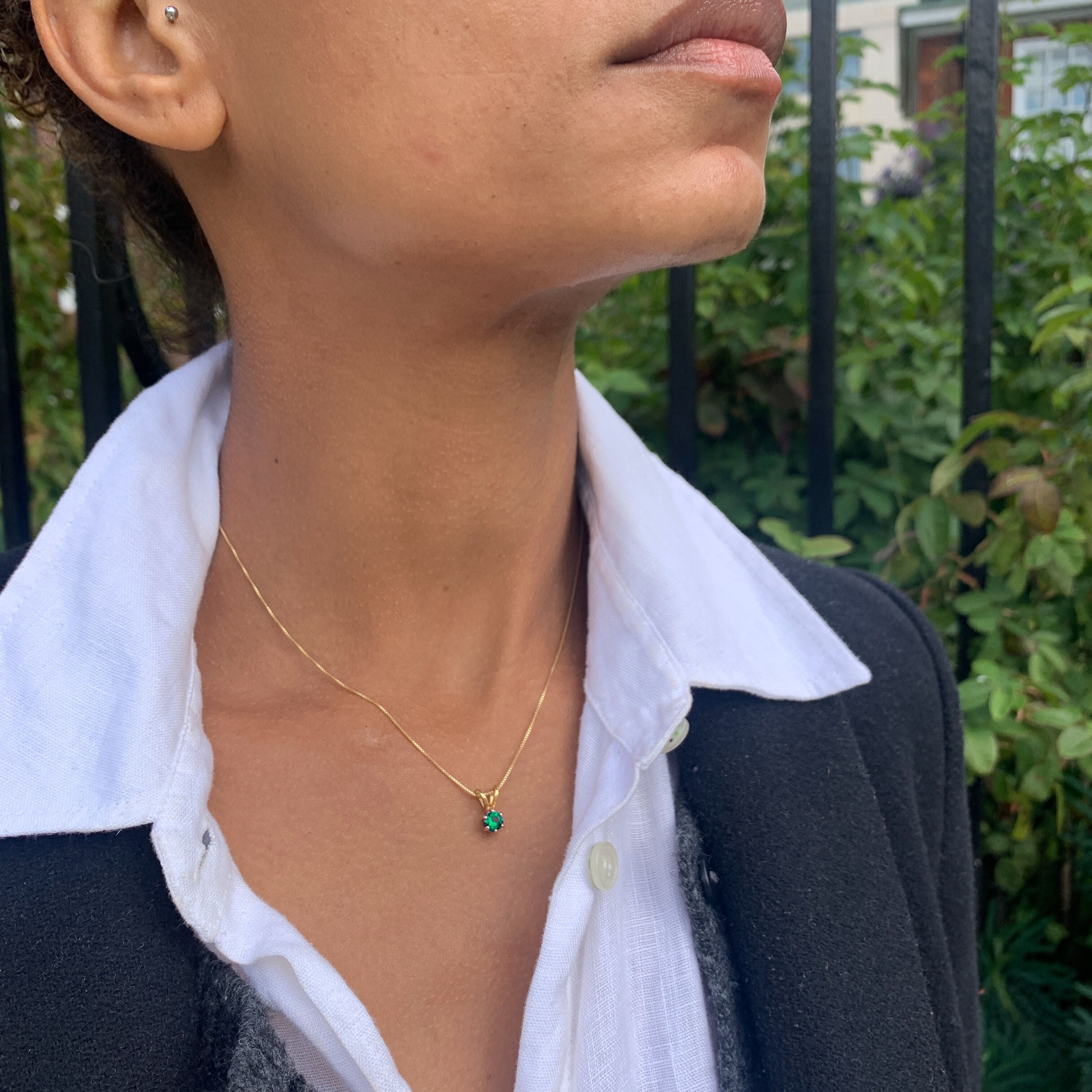 Elegant 18k Gold Vermeil Emerald Pendant featuring a round created green emerald, perfect for birthdays and special occasions.