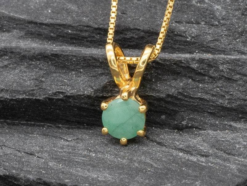 Timeless 18k Gold Vermeil Emerald Pendant, featuring a prong-set natural green emerald, ideal for daily wear and celebrations.