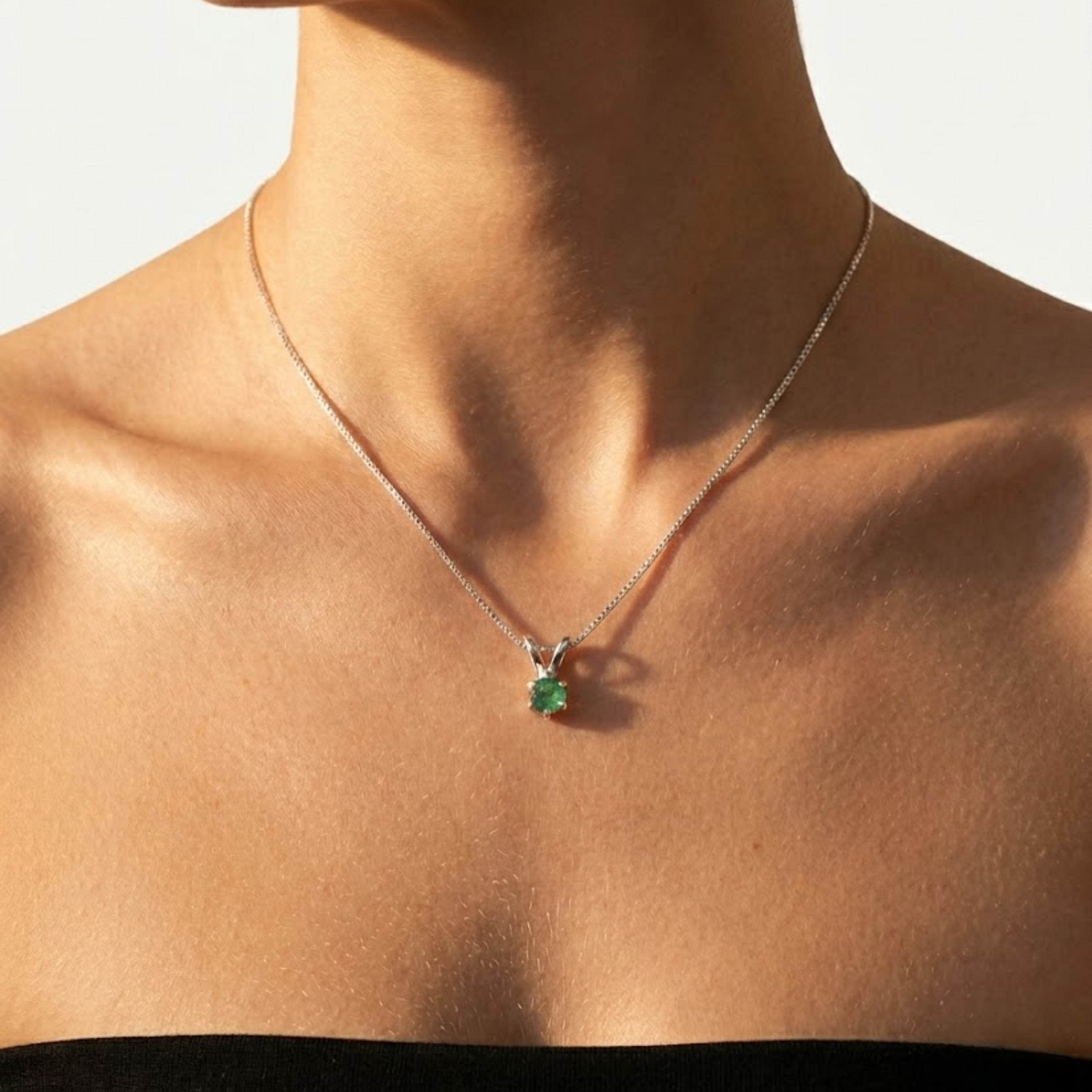 Elegant 925 Sterling Silver pendant featuring a natural green emerald, perfect as a May birthstone gift for any occasion.