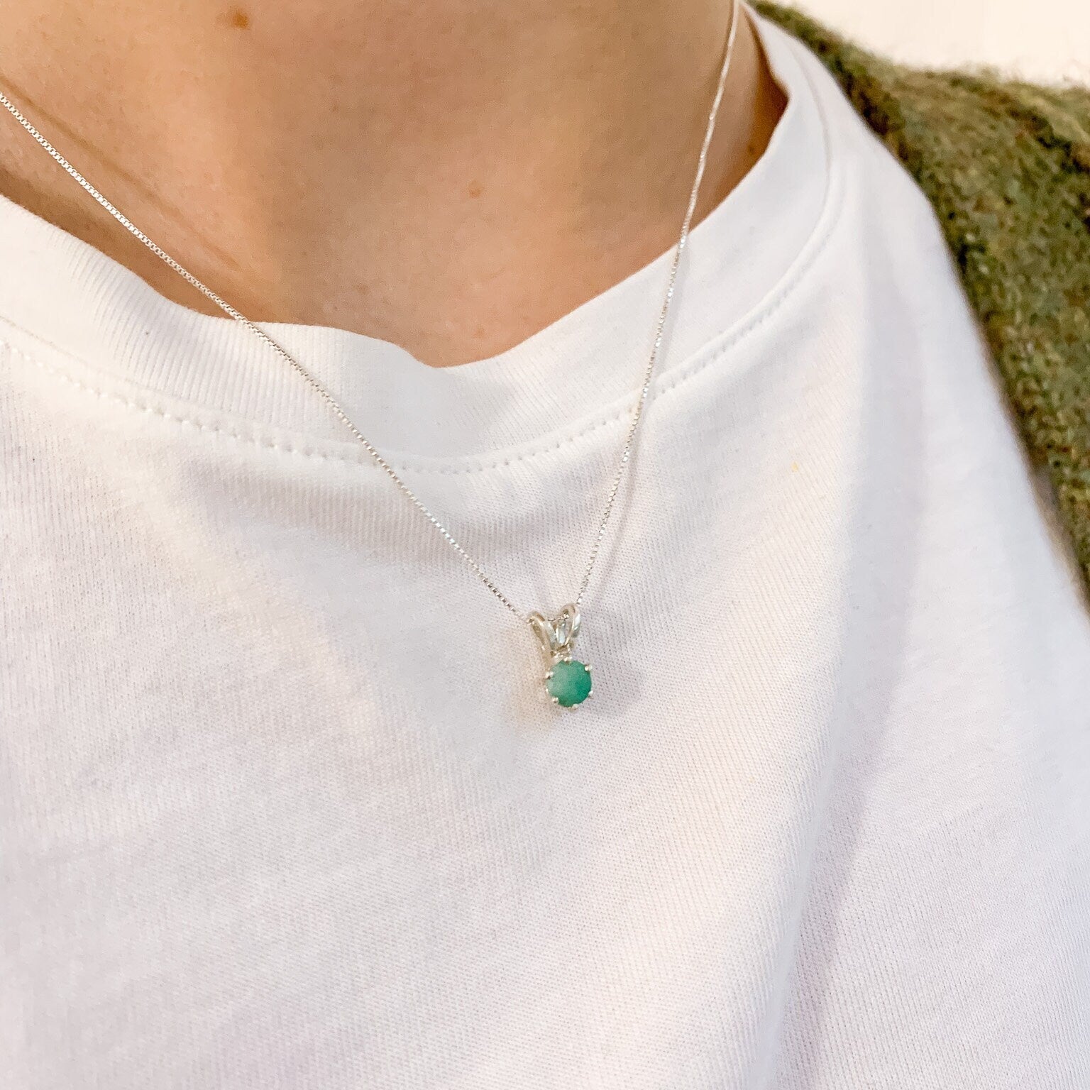 Elegant 925 Sterling Silver pendant featuring a natural green emerald, perfect as a May birthstone gift for any occasion.