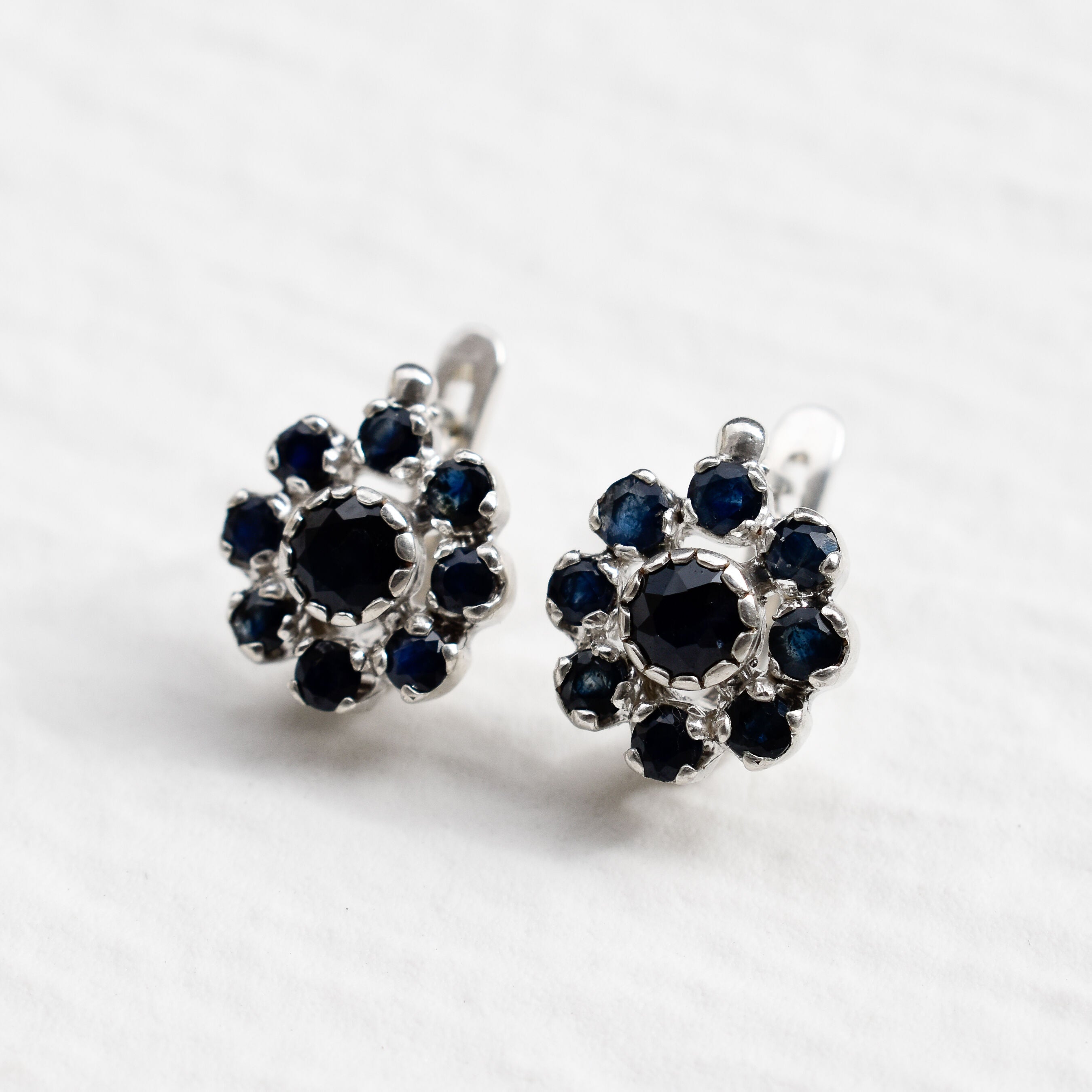 Sapphire Flower Earrings - Charming blue floral studs, crafted in 925 Sterling Silver, perfect for any occasion or everyday use.