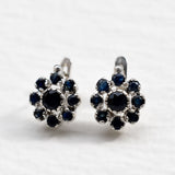 Sapphire Flower Earrings - Blue Floral Earrings - Silver Daisy Studs made in 925 Sterling Silver. Ideal for everyday wear and perfect for birthday gifting and special occasions.
