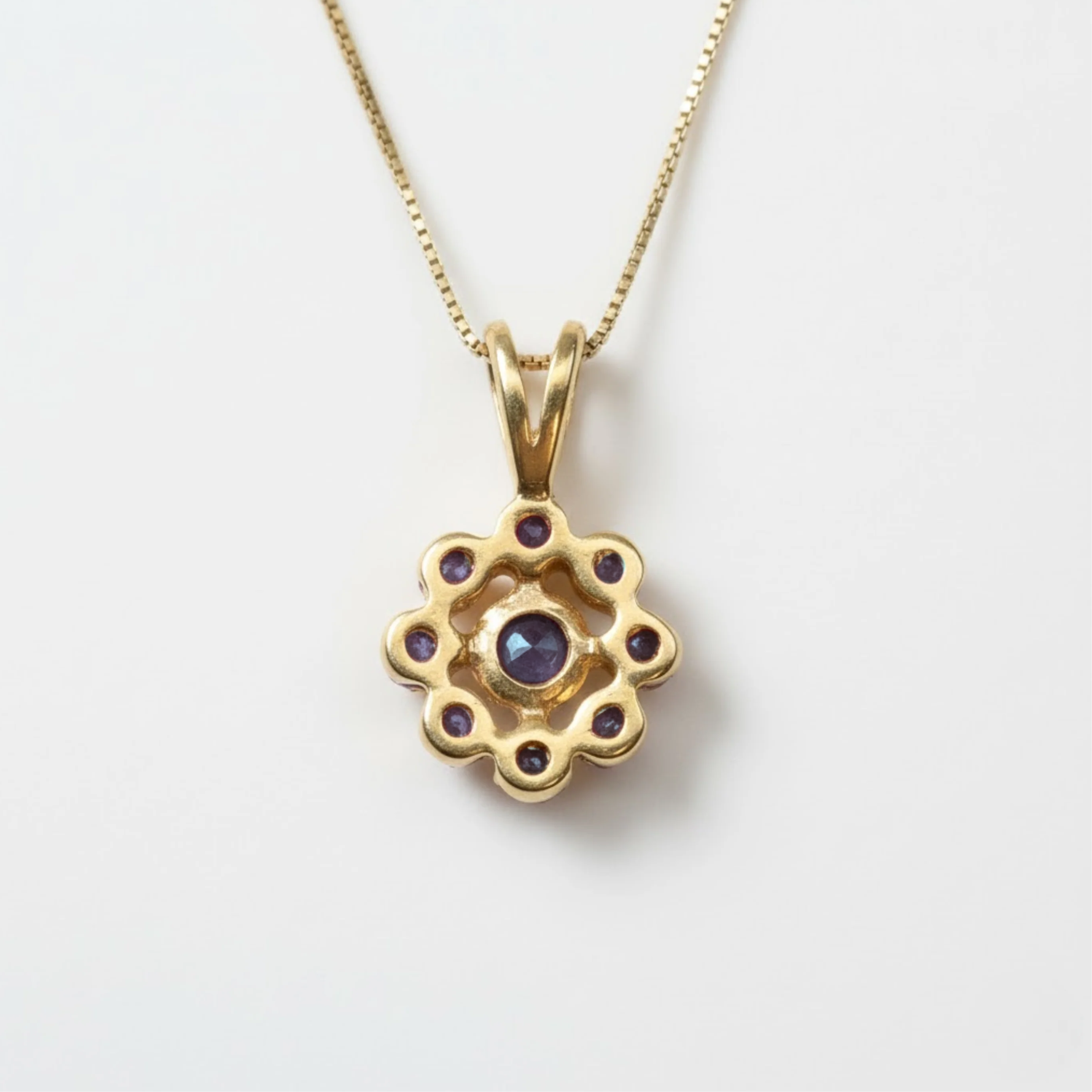 Delicate Blue Sapphire Flower Pendant in luxurious 18k Gold Vermeil, a beautiful choice for any occasion or gift.