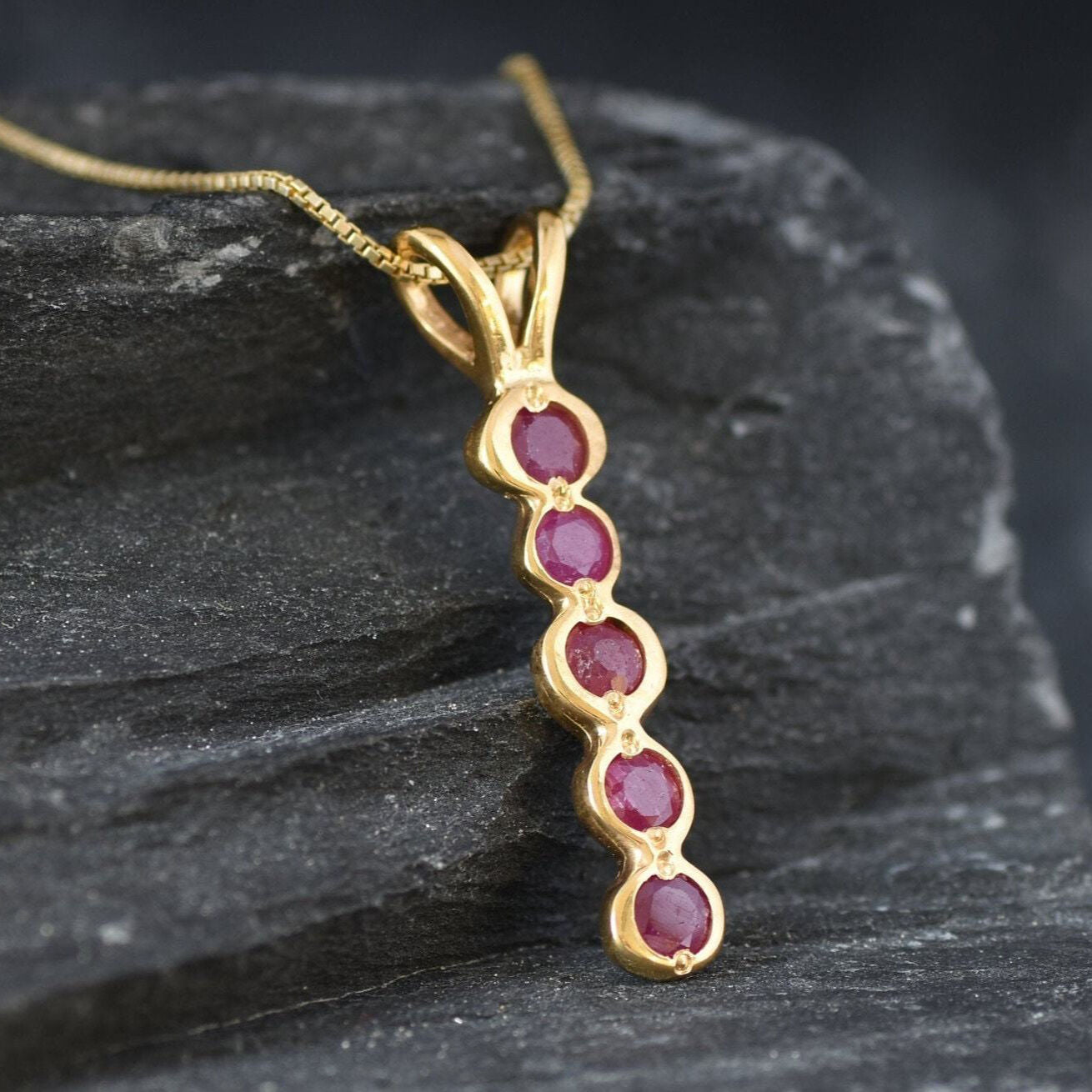Stunning natural ruby pendant in 18k gold vermeil, ideal for everyday elegance and celebrating July birthdays.